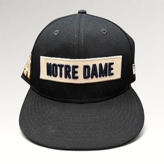 Raree Finds black Notre Dame Fighting Irish New Era 9FIFTY snapback hat with cream and navy wordmark patch