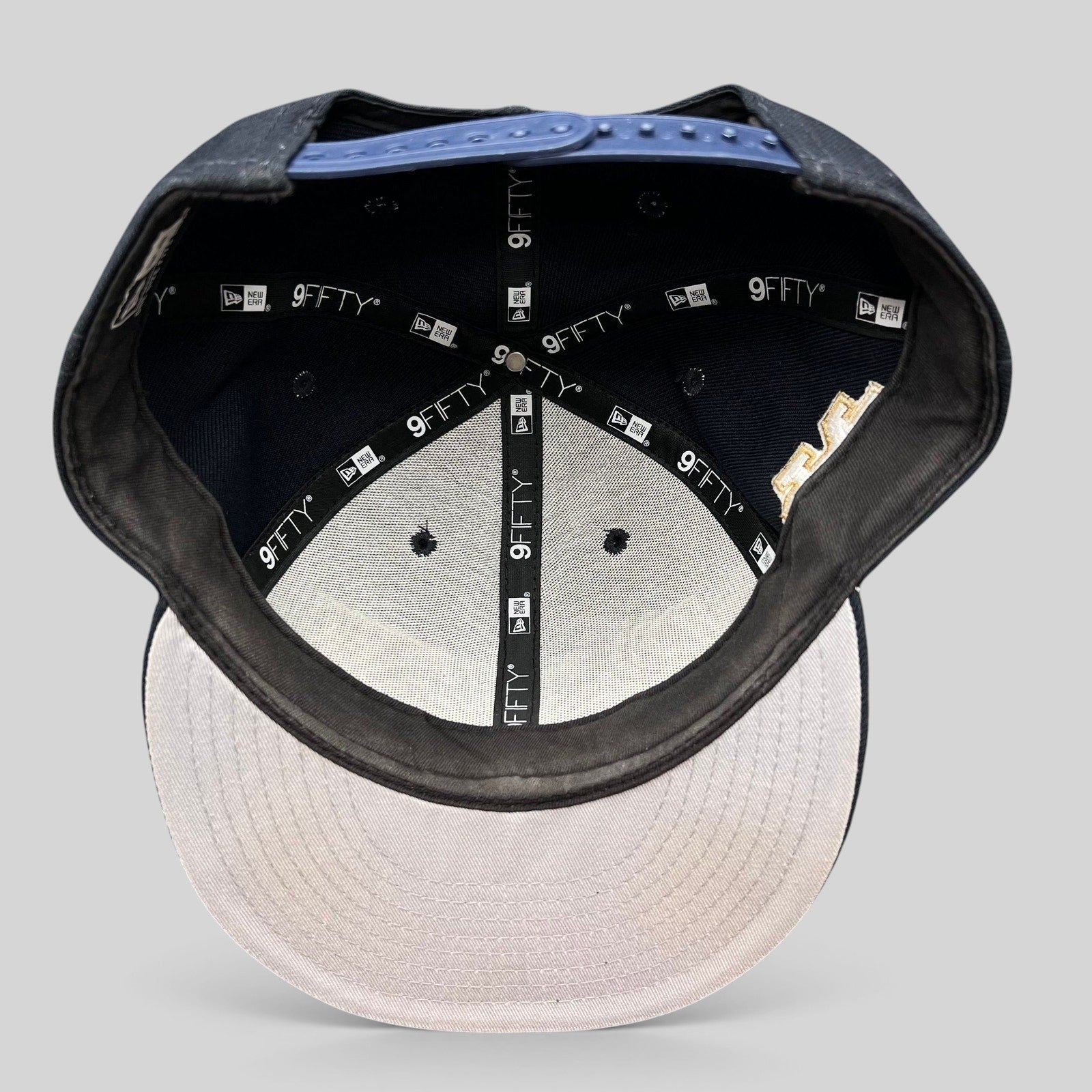 Raree Finds New Era 9FIFTY Notre Dame snapback hat interior view showing branded taping and structured crown