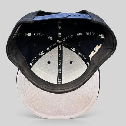 Raree Finds New Era 9FIFTY Notre Dame snapback hat interior view showing branded taping and structured crown