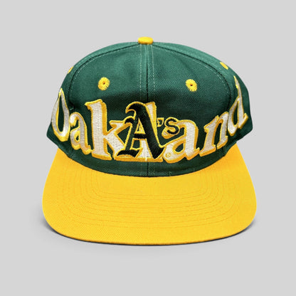 Raree Finds vintage 90s Oakland Athletics Logo 7 snapback hat with oversized green and yellow script embroidery