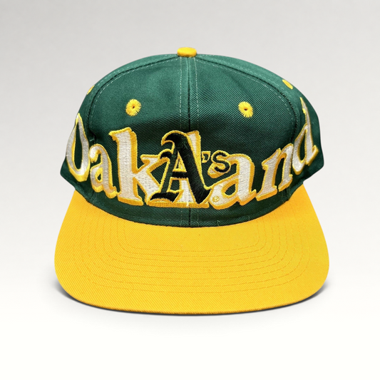 Raree Finds vintage 90s Oakland Athletics Logo 7 snapback hat with oversized green and yellow script embroidery