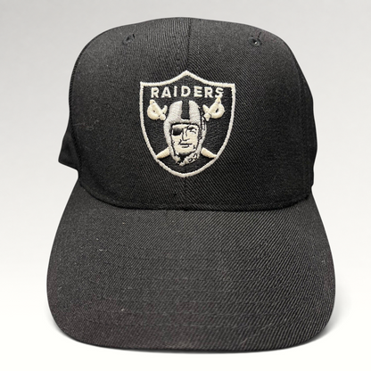 Raree Finds vintage Reebok Oakland Raiders black wool blend fitted hat with silver shield logo embroidery