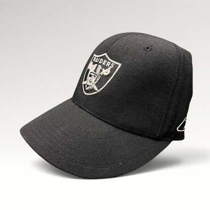 Raree Finds vintage Oakland Raiders Reebok fitted hat in black wool blend with silver embroidered shield logo