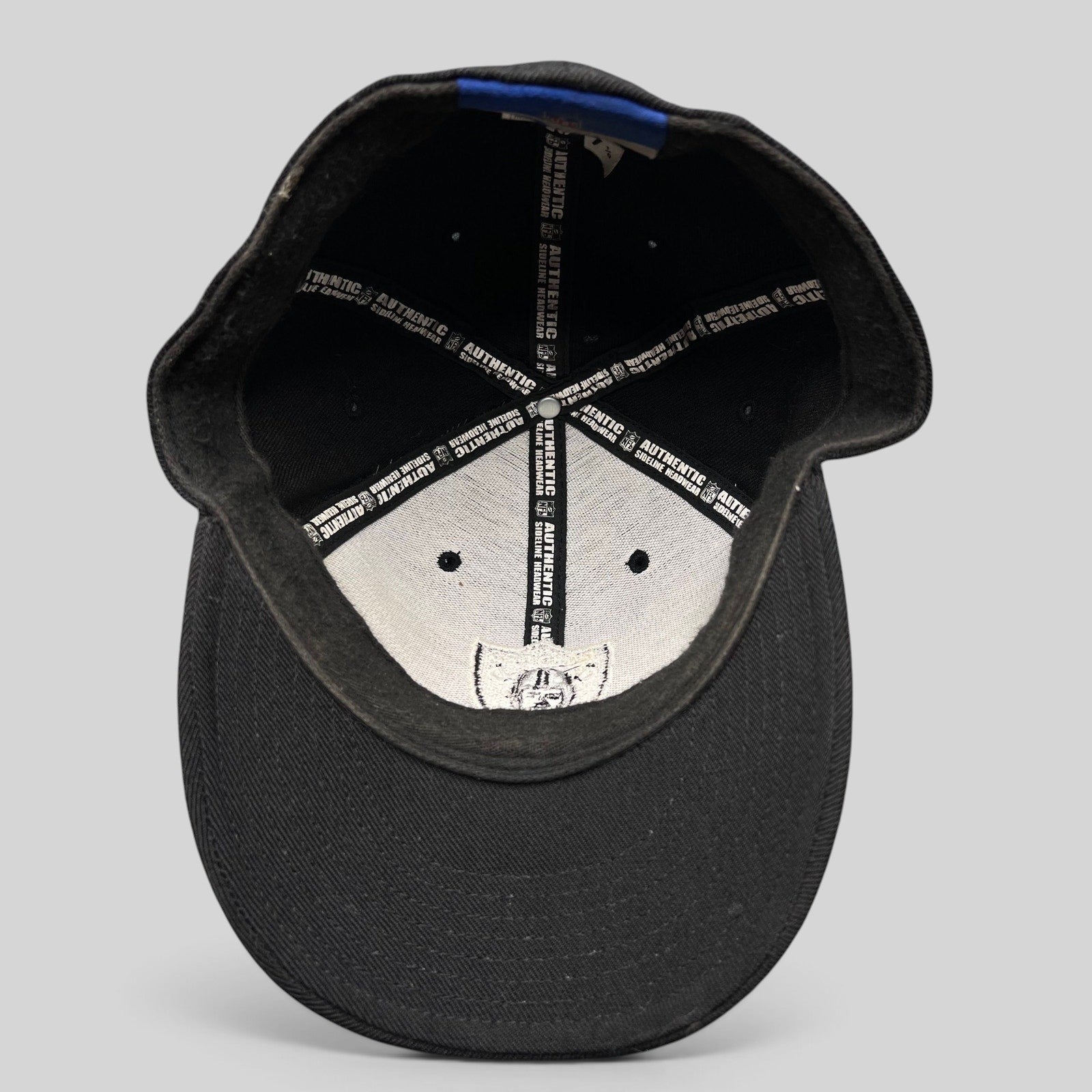 Raree Finds vintage Oakland Raiders Reebok fitted hat interior showing authentic NFL sideline branding and labels