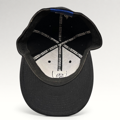 Raree Finds vintage Oakland Raiders Reebok fitted hat interior showing authentic NFL sideline branding and labels