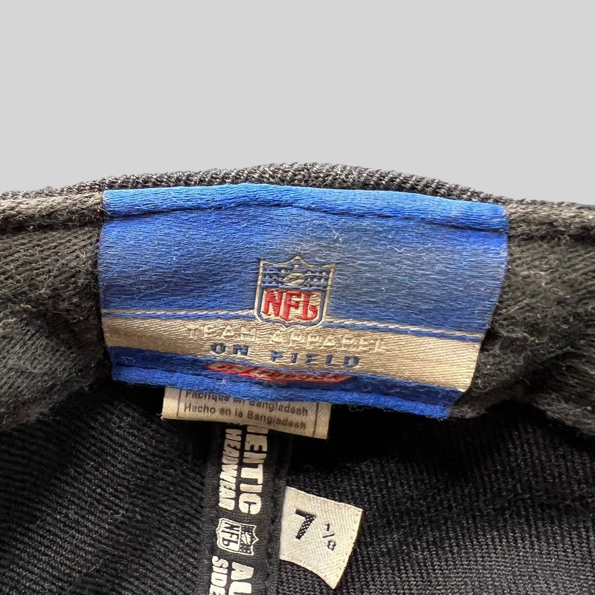 Raree Finds vintage Reebok NFL On-Field Oakland Raiders fitted hat interior label and size 7 1/8 tag