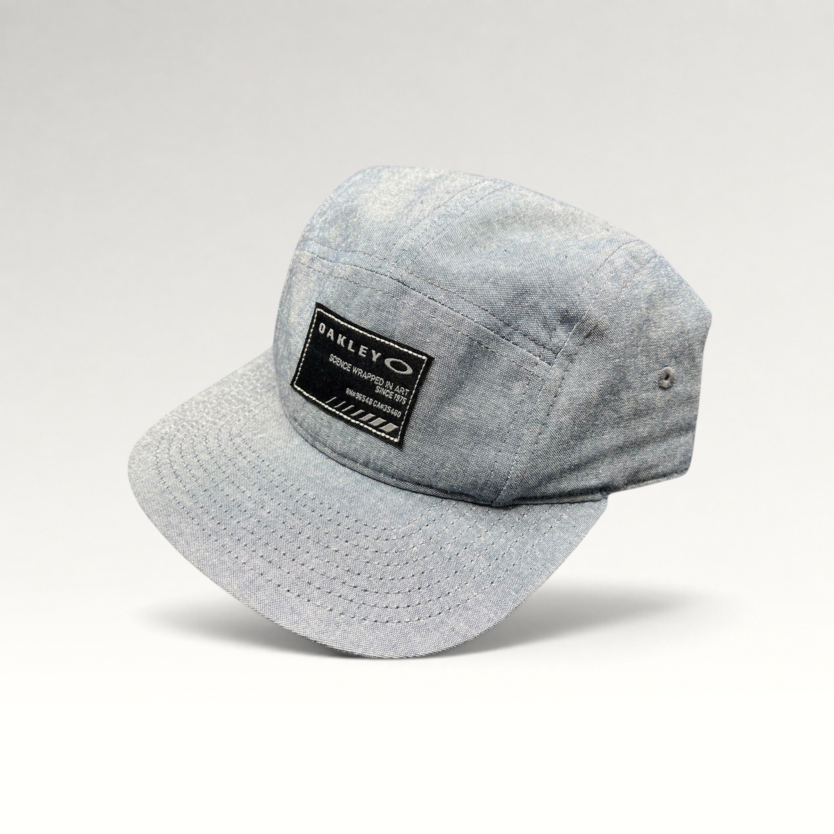 Raree Finds Oakley light denim chambray 5-panel camp cap with black Science Wrapped in Art front patch