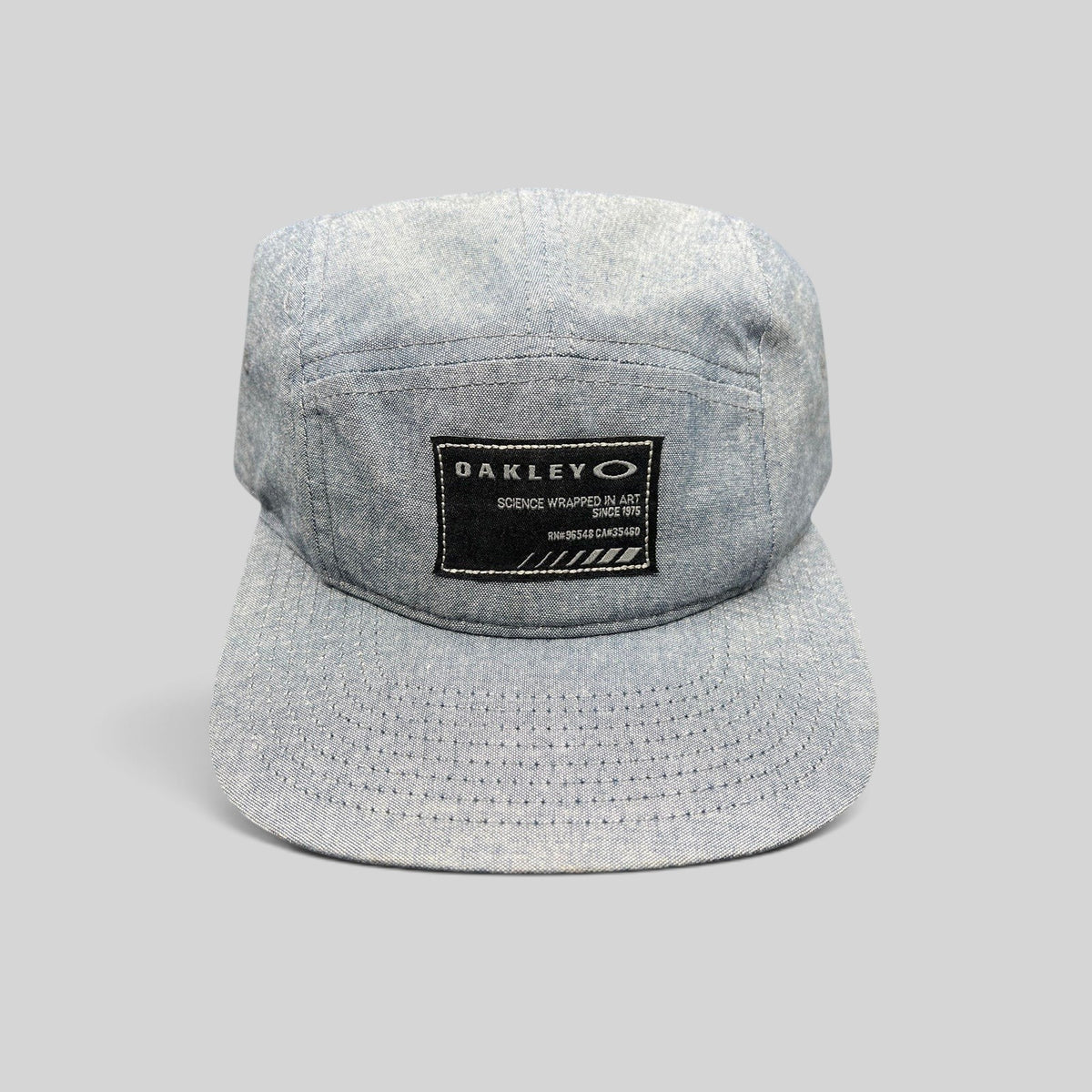 Raree Finds Oakley light denim chambray 5-panel camp cap with black Science Wrapped in Art front patch