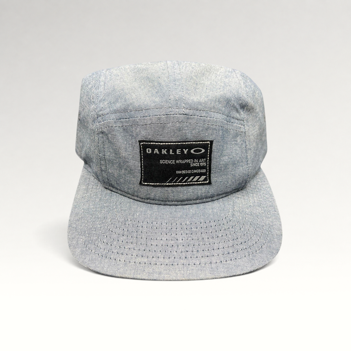 Raree Finds Oakley light denim chambray 5-panel camp cap with black Science Wrapped in Art front patch