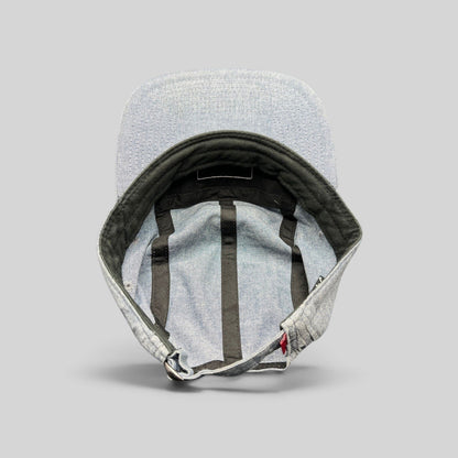 Raree Finds Oakley light denim chambray 5-panel cap interior view showing black taping and adjustable metal buckle