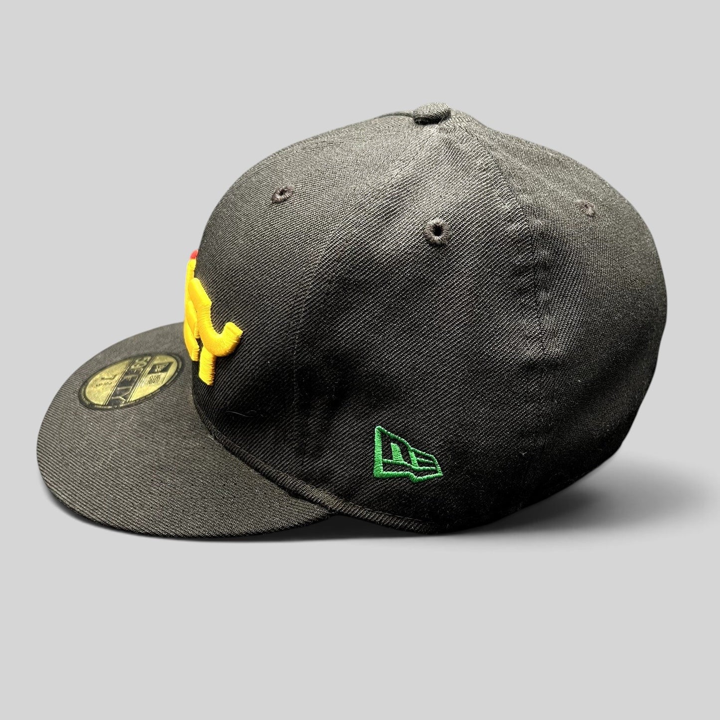 Raree Finds black Oakley New Era 59FIFTY fitted hat with 3D red and gold front logo and green side embroidery