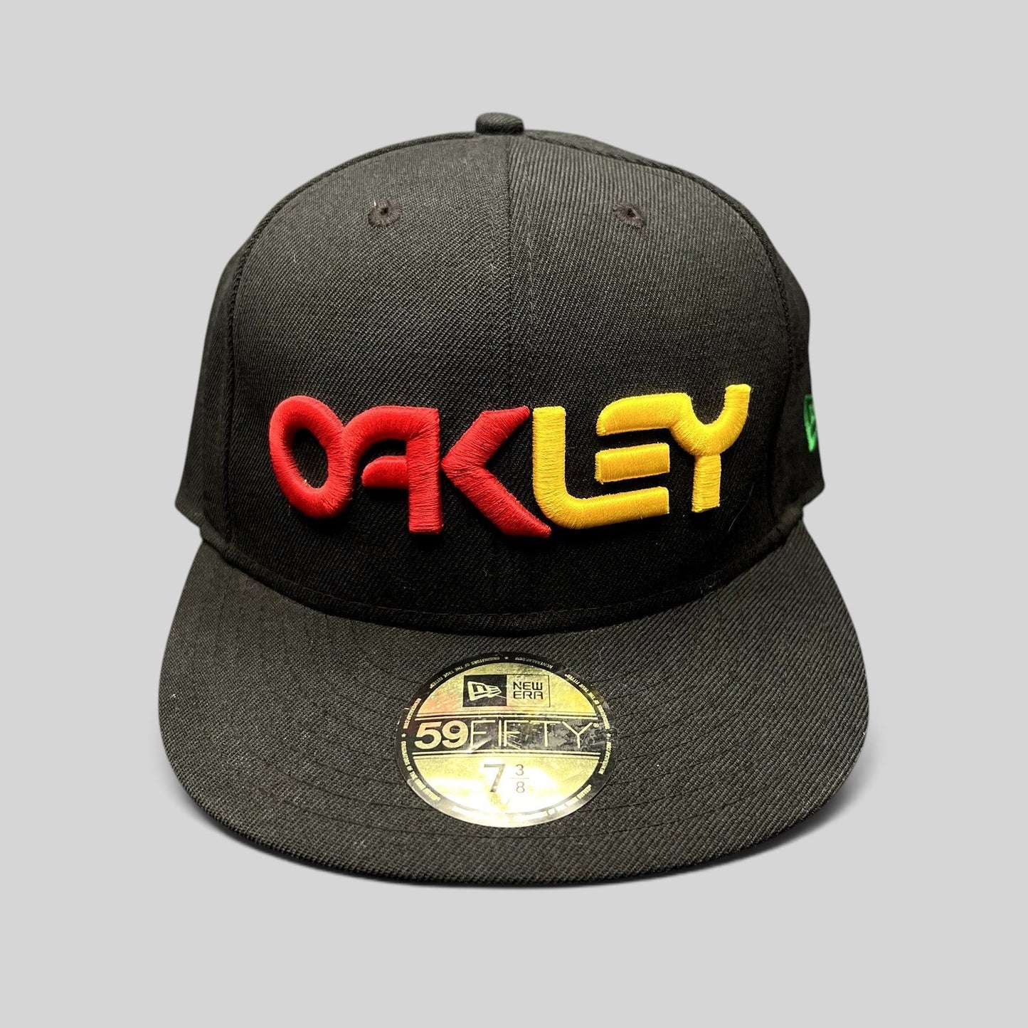 Raree Finds black Oakley New Era 59FIFTY fitted hat with a raised 3D red and yellow embroidered logo on the front