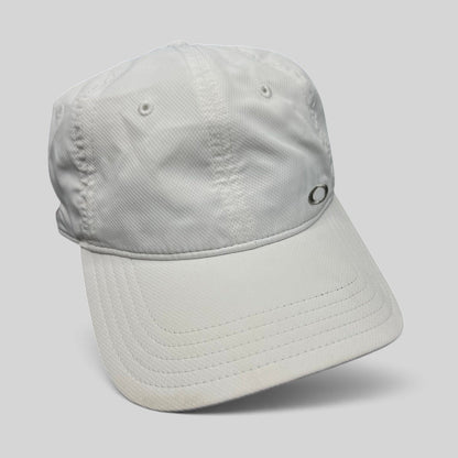 Raree Finds white Oakley Hydrolix performance hat with moisture-wicking polyester fabric and minimalist logo detail.