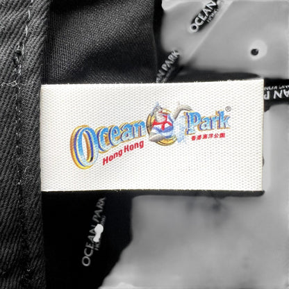 Raree Finds Ocean Park Hong Kong souvenir cap interior brand label with logo on black fabric