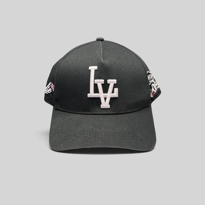 Raree Finds black Okami Brand strapback hat with white embroidered LV logo and detailed side panel artwork