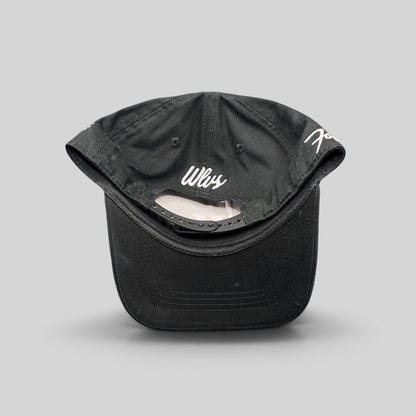 Raree Finds black Okami Brand strapback hat with white Wlvs script embroidery on the back and adjustable strap closure