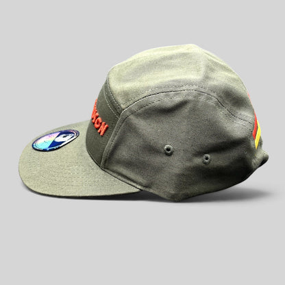 Raree Finds olive green 5-panel strapback hat with red The Slauson embroidery and yellow rear stripe detail.