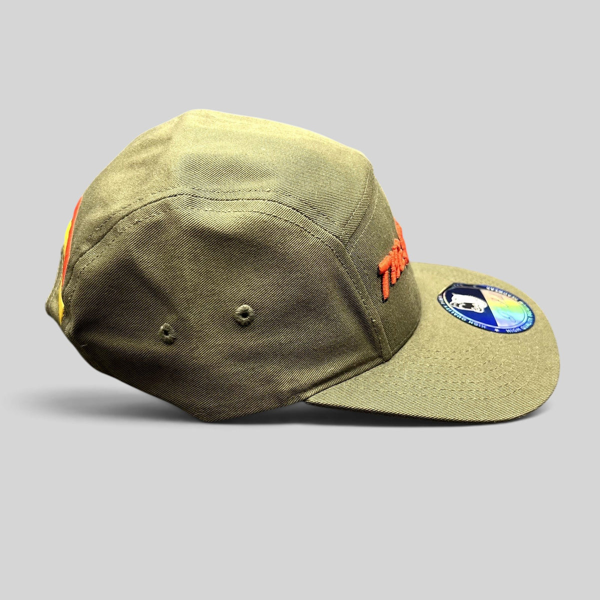 Raree Finds olive green 5-panel cotton strapback hat with red The Slauson script embroidery and side profile view.