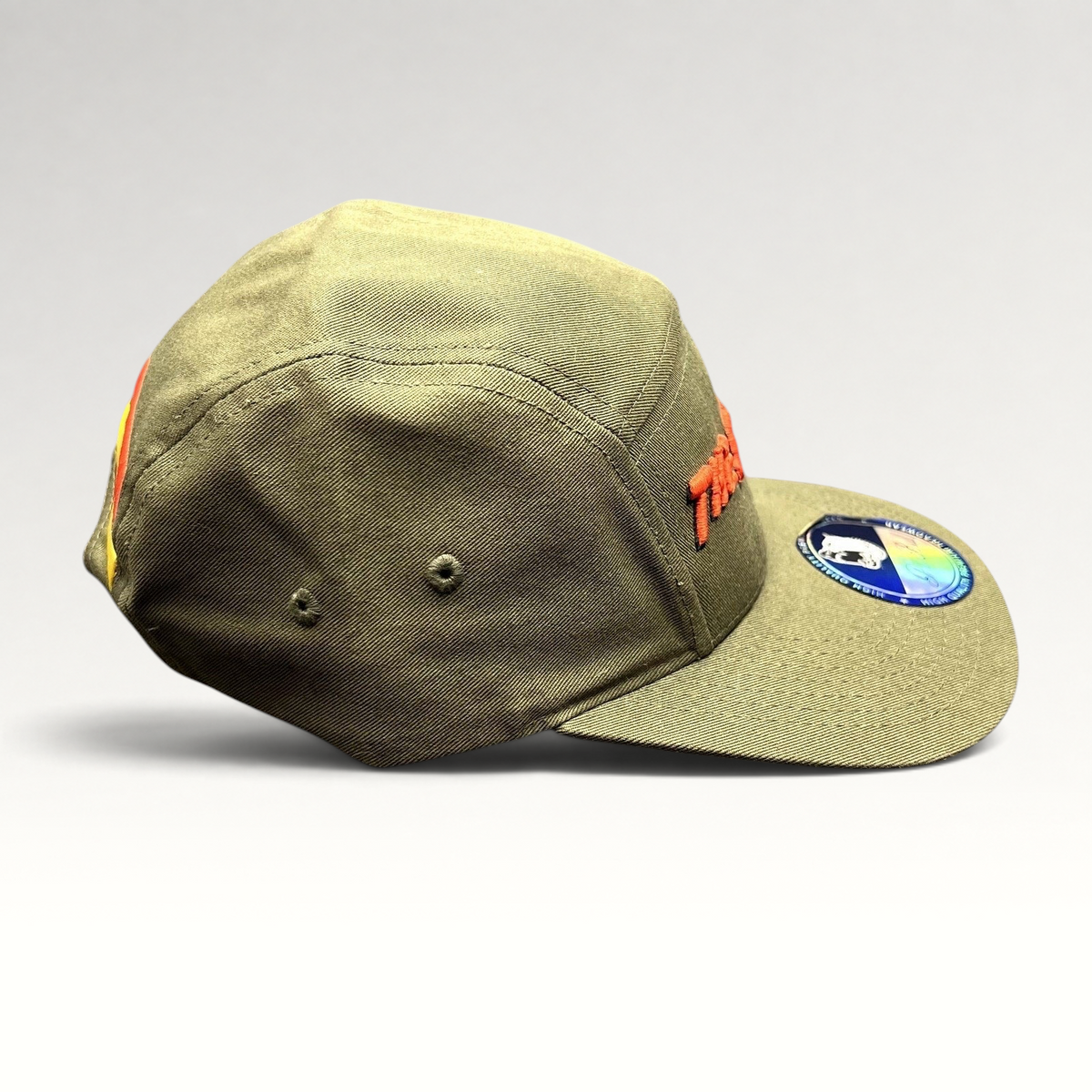 Raree Finds olive green 5-panel cotton strapback hat with red The Slauson script embroidery and side profile view.