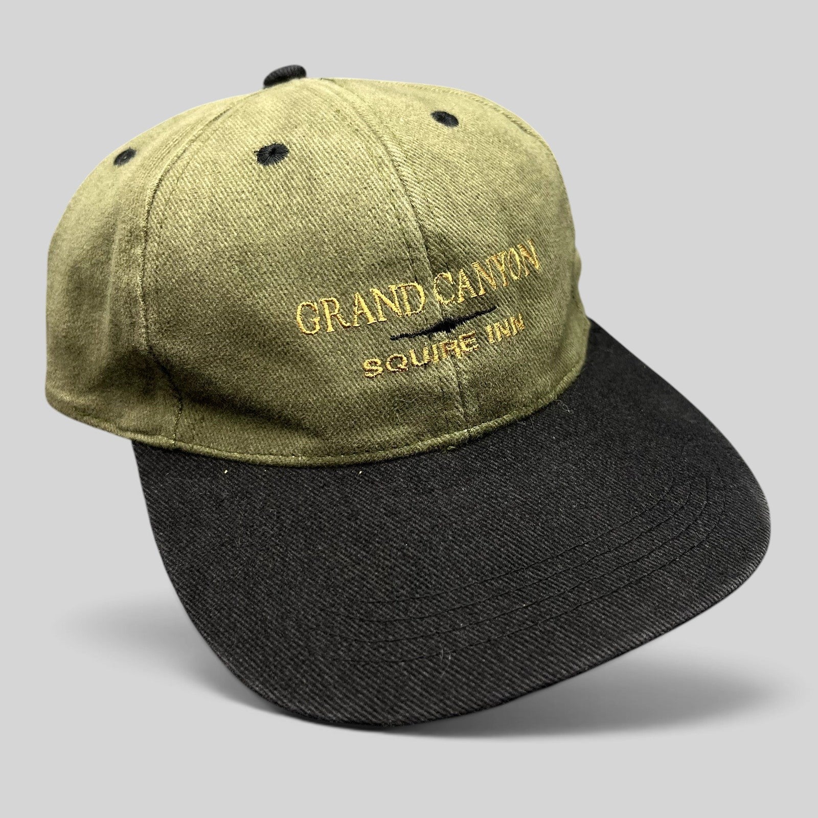 Raree Finds vintage olive green and black cotton strapback hat with Grand Canyon Squire Inn embroidery