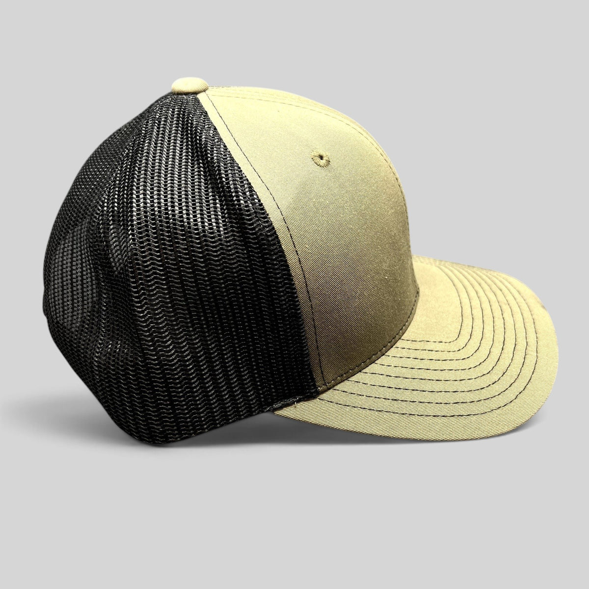 Raree Finds olive and black Richardson 112 trucker hat with a structured curved brim and breathable mesh back