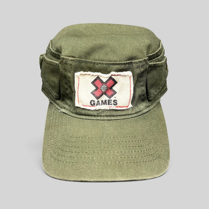 Raree Finds vintage olive green cotton cadet military cap with a distressed X Games patch on the front