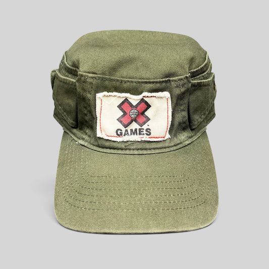 Raree Finds vintage olive green cotton cadet military cap with a distressed X Games patch on the front