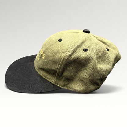 Raree Finds vintage Grand Canyon Squire Inn strapback hat in olive green cotton with a black brim and embroidery.