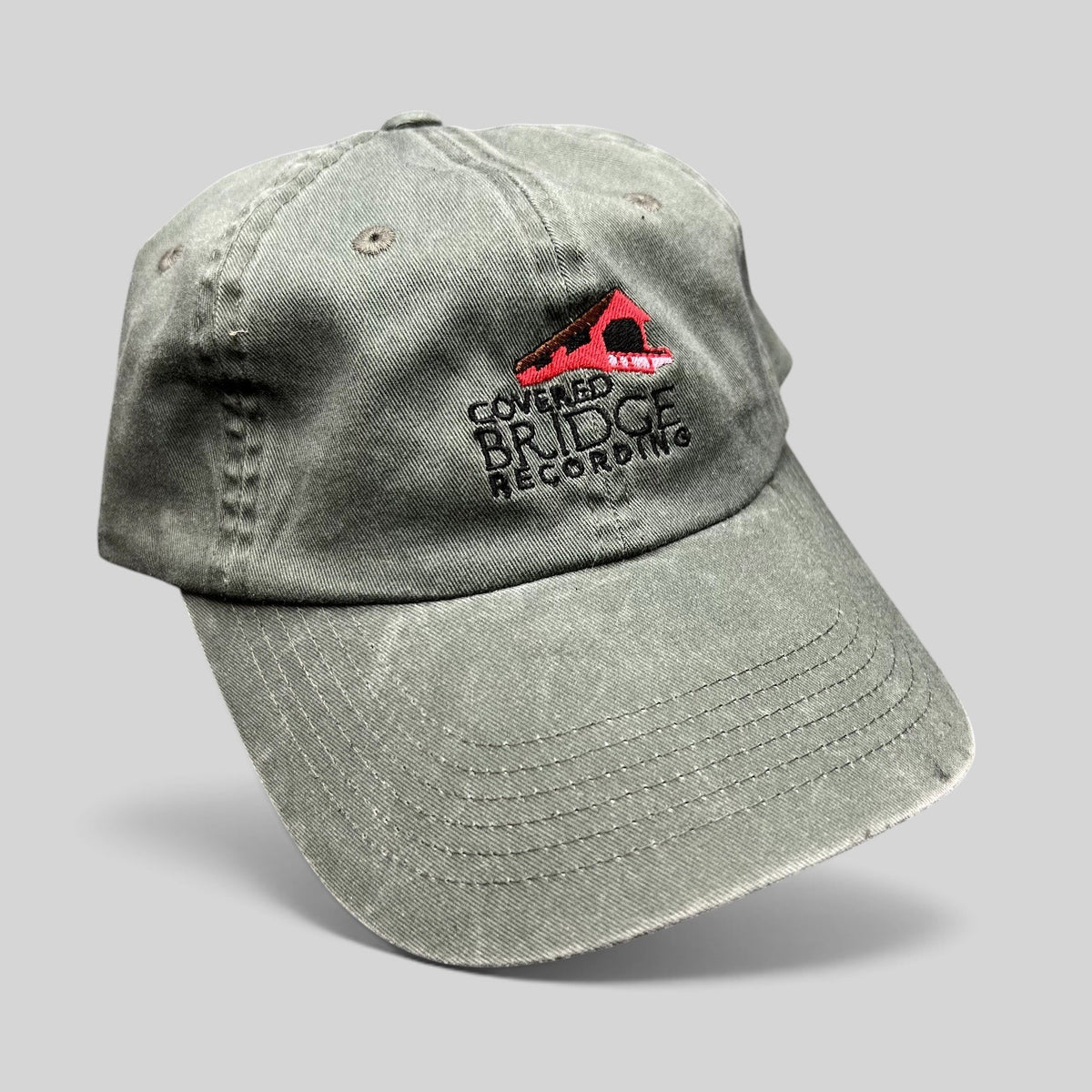 Raree Finds olive green garment-washed cotton strapback hat with Covered Bridge Recording studio logo embroidery