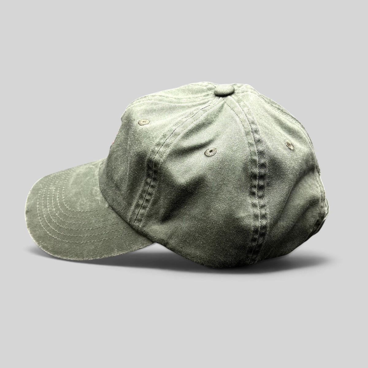 Raree Finds olive green garment-washed cotton strapback hat with curved brim and brass-tone buckle