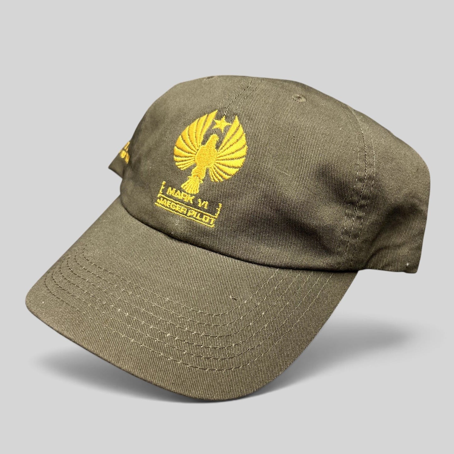Raree Finds olive drab cotton strapback hat with gold embroidered Pacific Rim Uprising Jaeger Pilot insignia