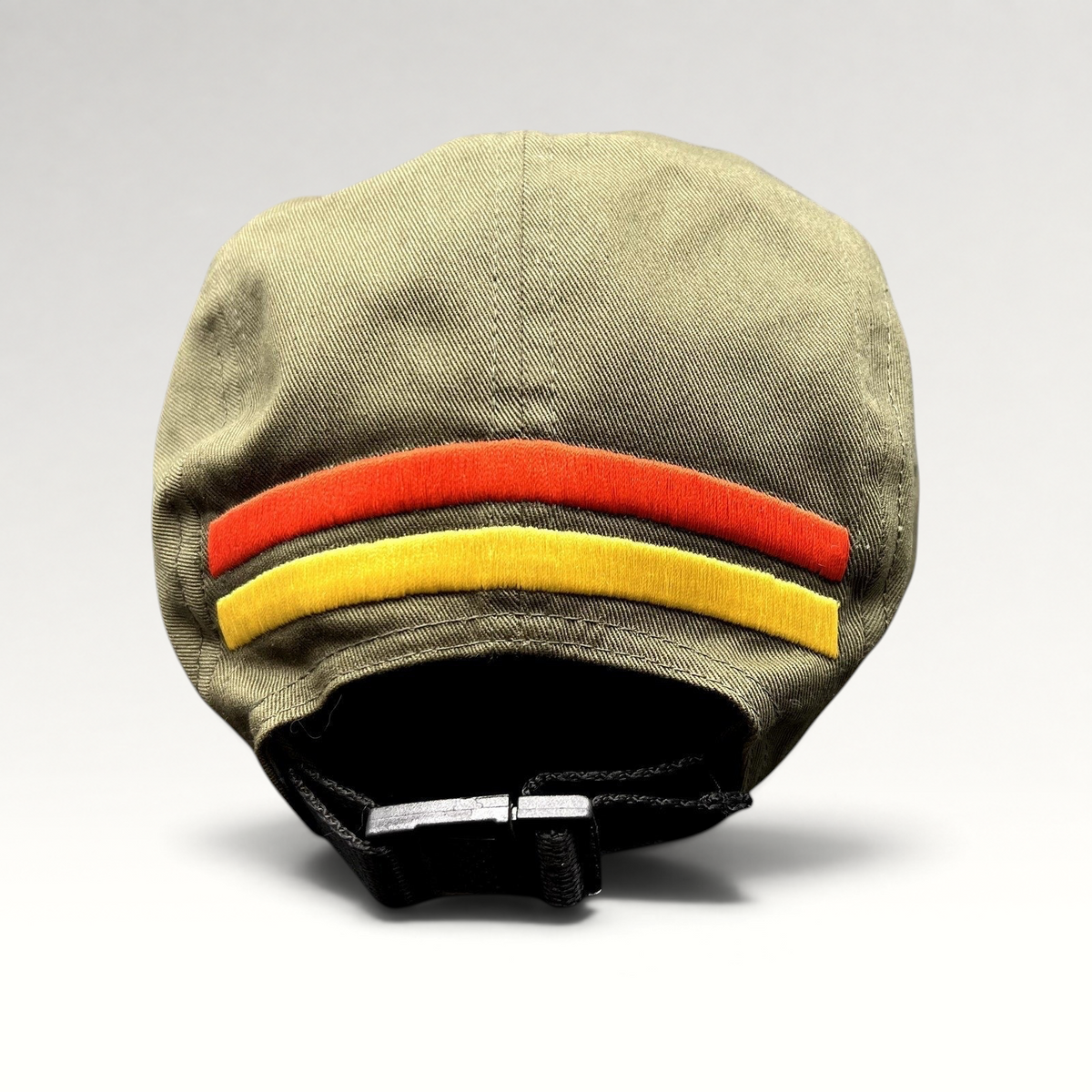 Raree Finds olive green 5-panel strapback hat with red and yellow rear stripes and adjustable black buckle closure.