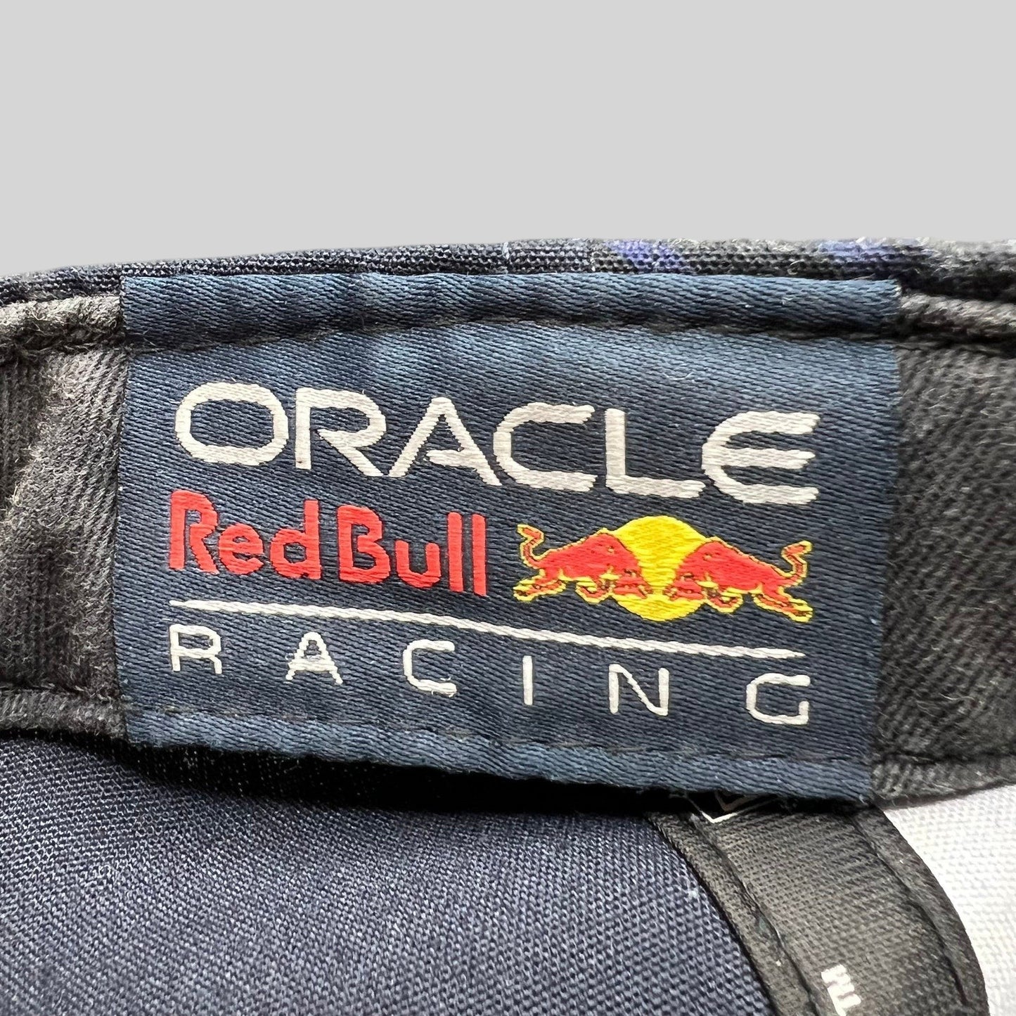 Raree Finds Oracle Red Bull Racing interior brand label on a navy New Era 9FORTY F1 cap