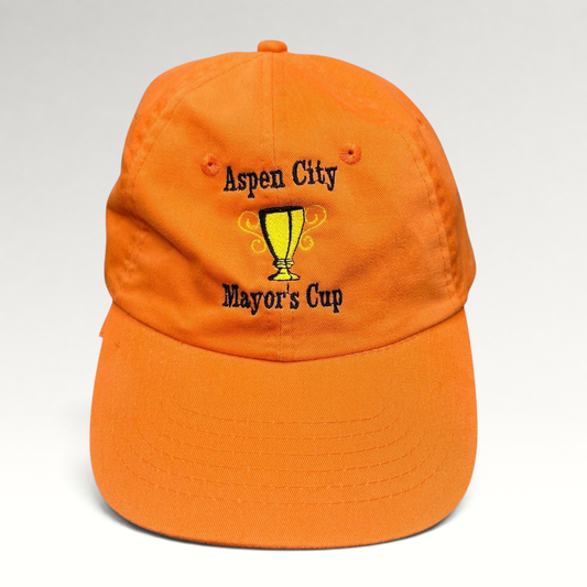 Raree Finds orange cotton dad cap featuring an embroidered Aspen City Mayor’s Cup trophy graphic and strapback closure.
