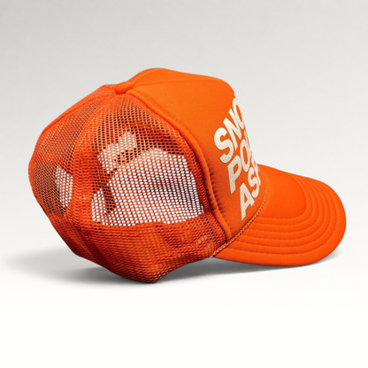 Raree Finds bright orange Snow Polo Aspen trucker hat with white graphic lettering and breathable mesh back panel.