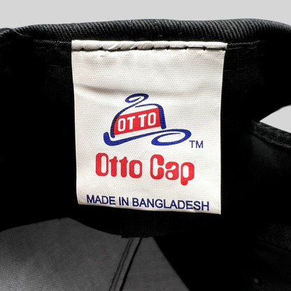 Raree Finds vintage Otto Cap brand label inside a black snapback hat made in Bangladesh