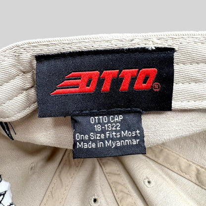 Raree Finds OTTO Cap interior tag showing brand logo and manufacturing details on a beige cotton twill hat