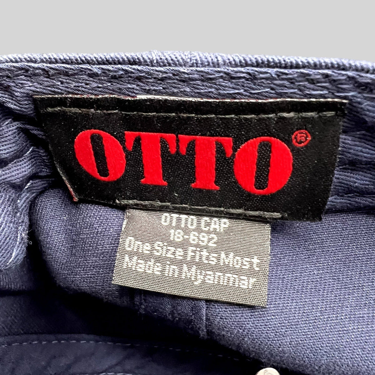 Raree Finds navy cotton twill dad hat interior showing the Otto Cap brand label and size tag