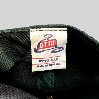 Raree Finds vintage Otto Cap label inside a dark green snapback hat, made in Thailand.