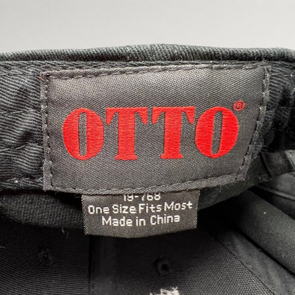 Raree Finds vintage OTTO Cap interior label with red logo text and size information on a black cotton snapback hat