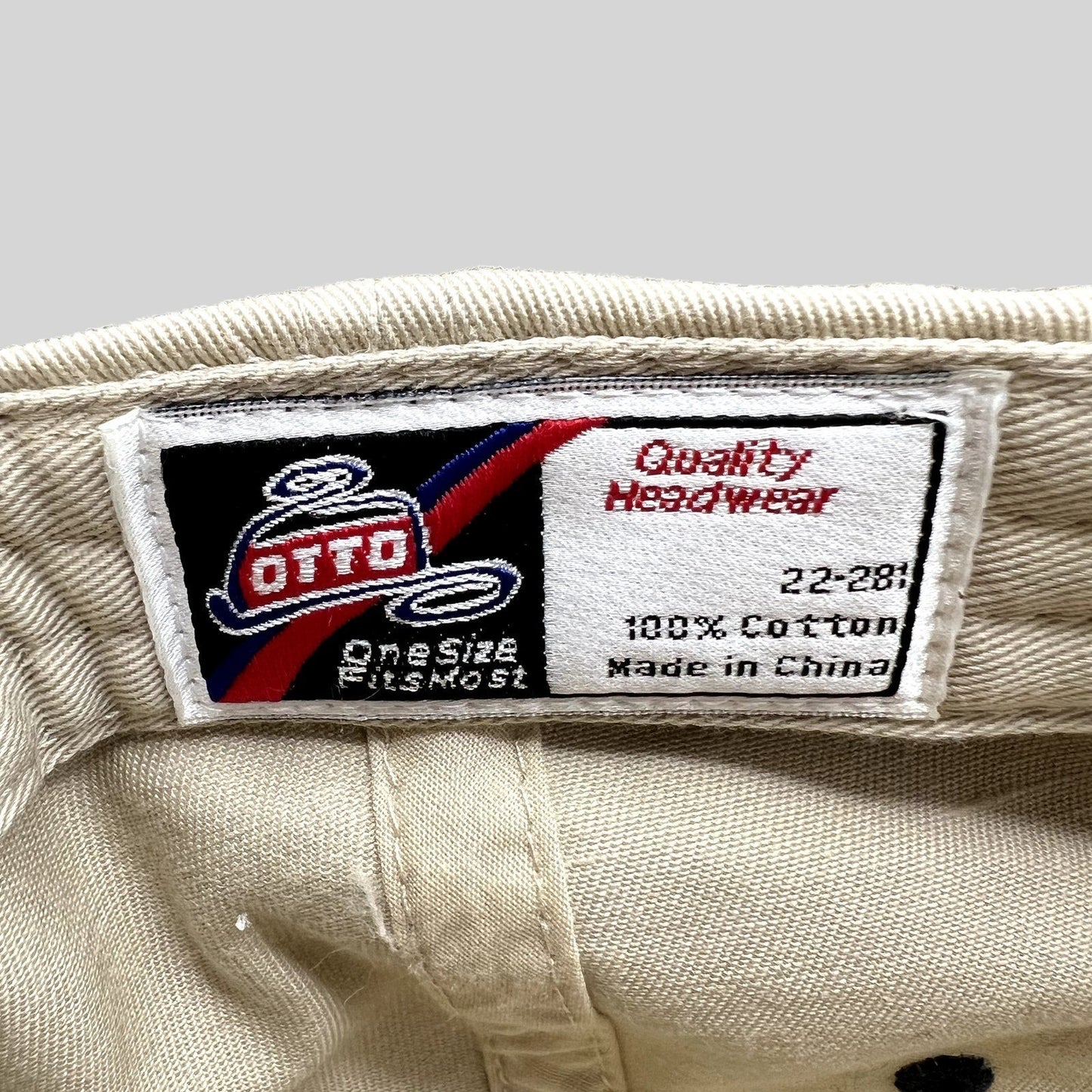 Raree Finds vintage Otto cap interior label showing 100% cotton material and quality headwear branding