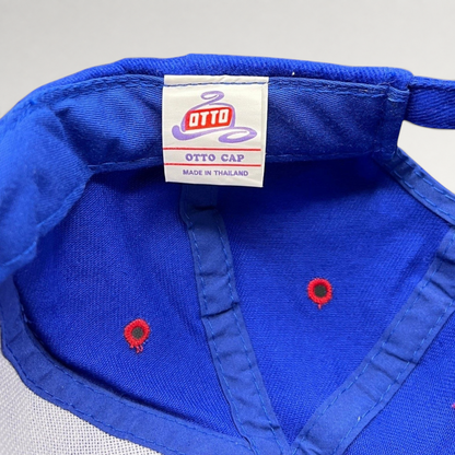 Raree Finds vintage 90s Otto Cap snapback hat interior label showing royal blue fabric and red ventilation eyelets