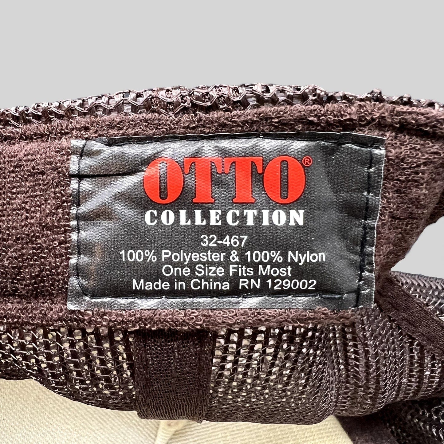 Raree Finds OTTO Collection brown polyester and nylon trucker hat interior care label