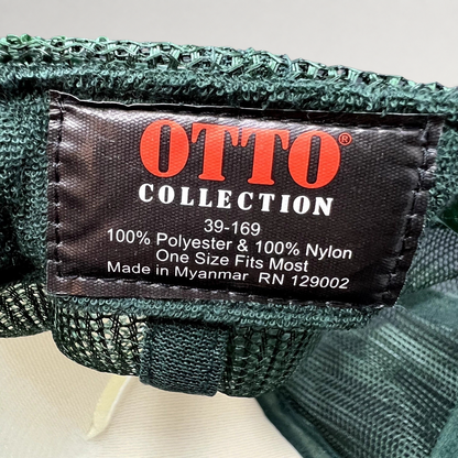 Raree Finds OTTO Collection trucker hat interior tag showing polyester and nylon material details
