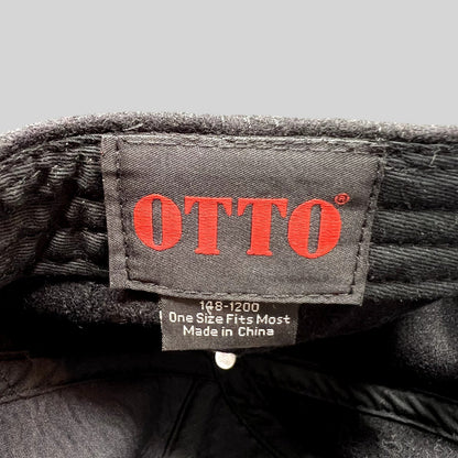 Raree Finds Otto brand label inside a black wool blend Ikon Pass strapback hat with size and origin information.