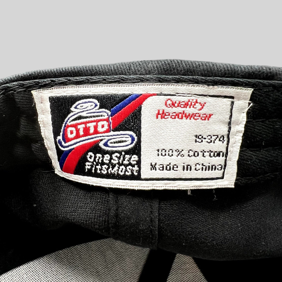 Raree Finds vintage OTB City Headwear cotton hat interior tag with Otto branding and care information
