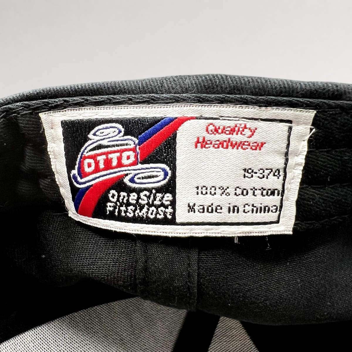 Raree Finds vintage OTB City Headwear cotton hat interior tag with Otto branding and care information
