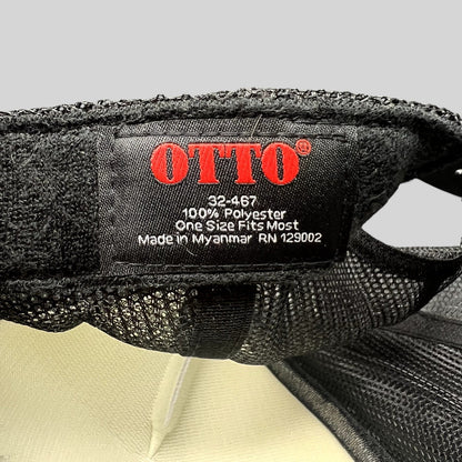 Raree Finds Otto trucker hat interior tag showing 100 percent polyester material and made in Myanmar details