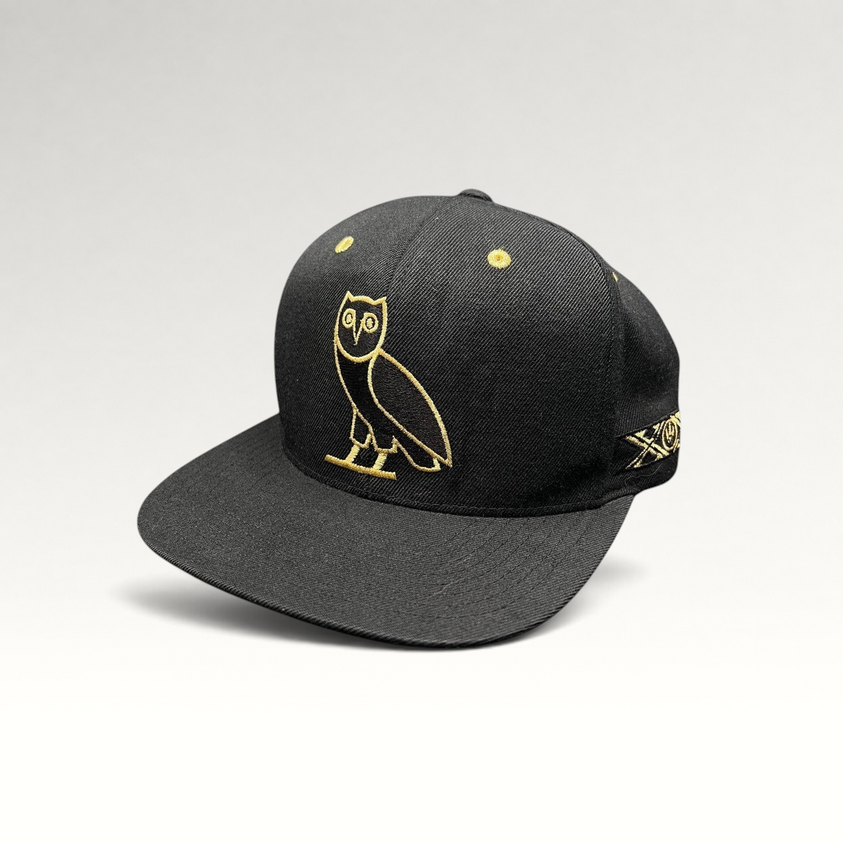 Raree Finds black and gold OVO owl snapback hat from the 2015 Toronto Raptors Mitchell & Ness collaboration