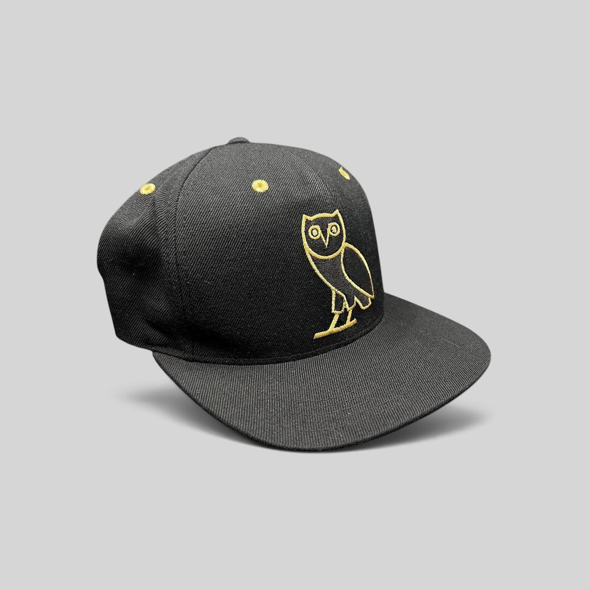Raree Finds black and gold OVO owl snapback hat from the 2015 Toronto Raptors Mitchell & Ness collaboration